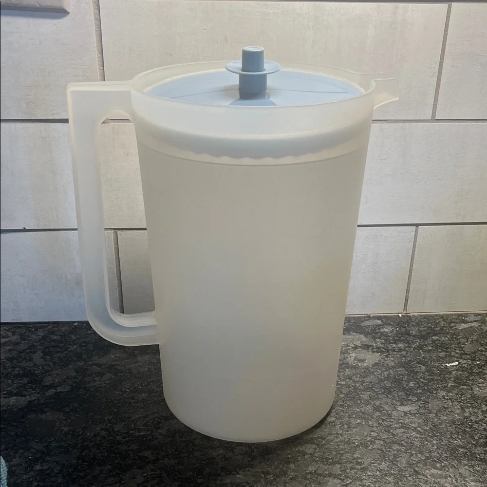 Gallon size Translucent White Pitcher with Blue Lid by Tupperware